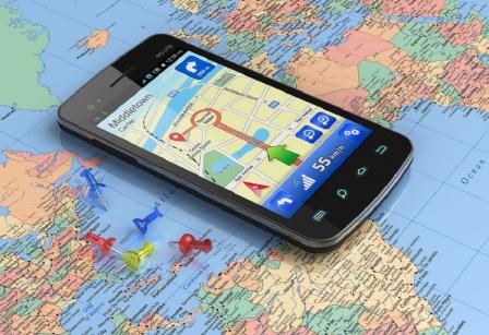 Smartphone with GPS navigation on world map